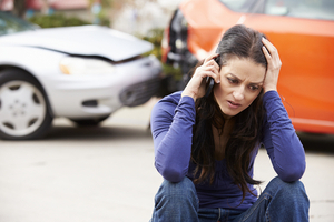 Woman Calling in Accident
