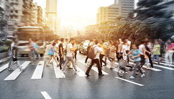 pedestrian walking on a crosswalk, representing pedestrian accidents
