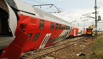 photo of a derailed train, representing train accidents